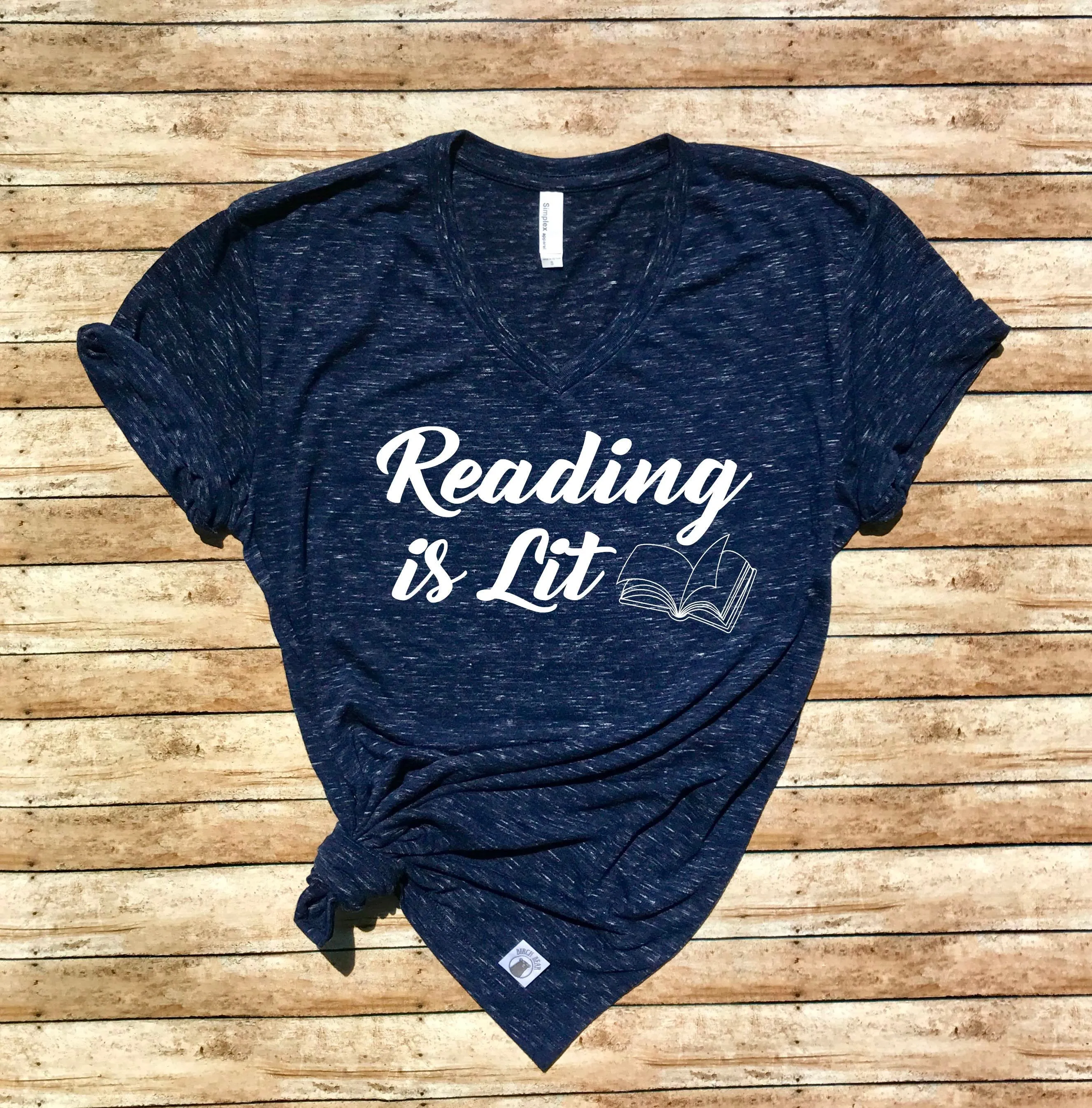 Reading Is Lit Book Shirt - Reading Shirt Book Lover Gift - Book Reader Shirt - Teacher Shirt - Funny Teacher T Shirt Unisex V Neck T Shirt
